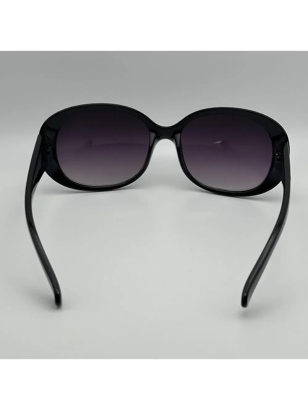 Franco Sarto Black Oversized Sunglasses with Purple Gradient Lenses